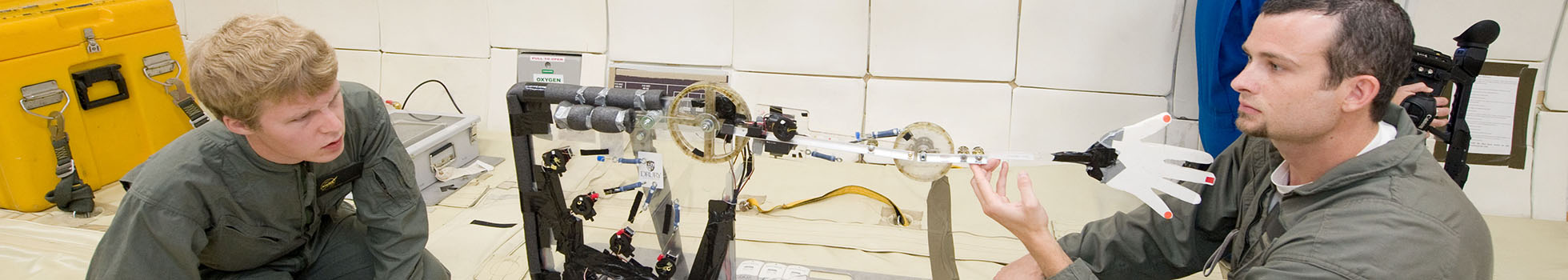 Students working together on physics project.