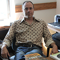 Portrait of David Derossett.