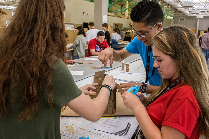 High school students working on a project.