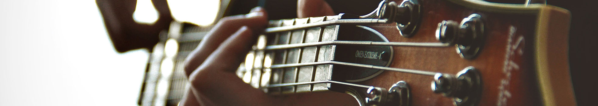 Close up of someone playing a guitar