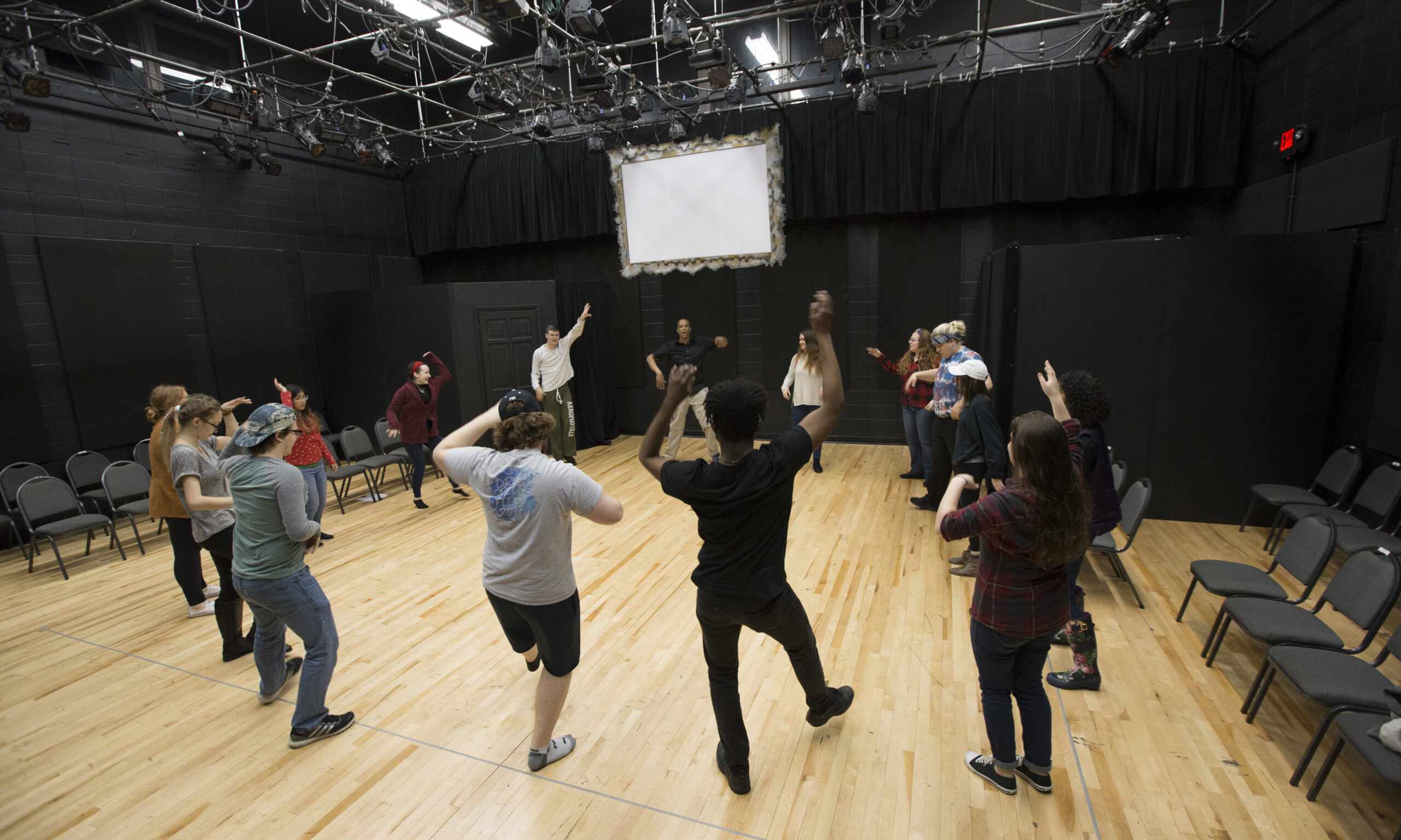 Students participating in an improv exercise.