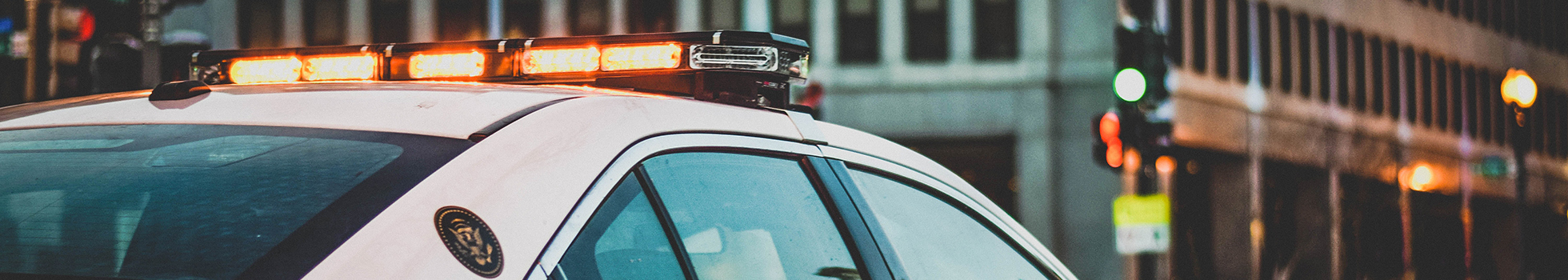 Police car with siren lights.