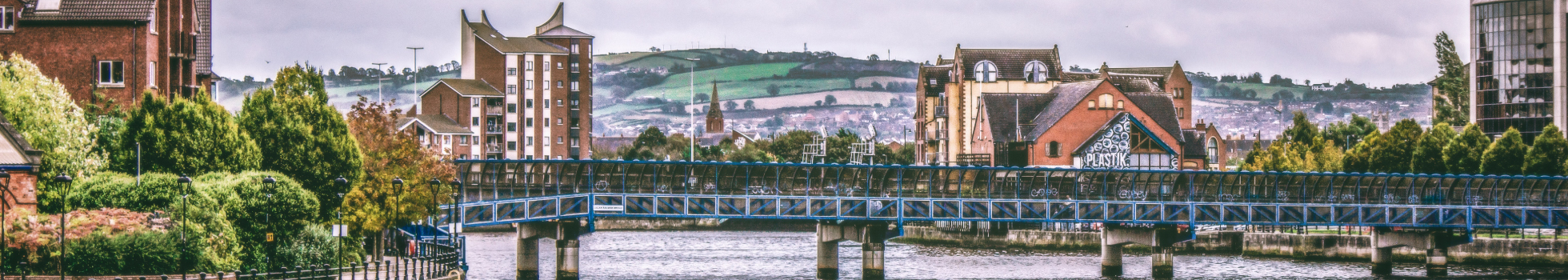 Looking back up the River Lagan from Thanksgiving Square at Queen's Bridge in the CIty Centre.