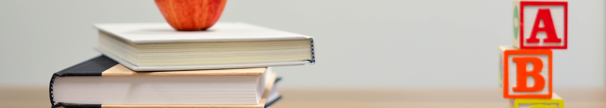 Books, an apple, and ABC blocks