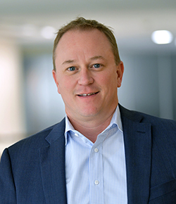 Headshot of DU Trustee John Myers